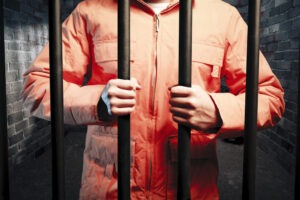 DUI offender holds cell bars in Ohio jail