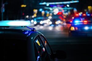 Police cars responding to a crime of moral turpitude